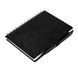 A6 notebook with a pen